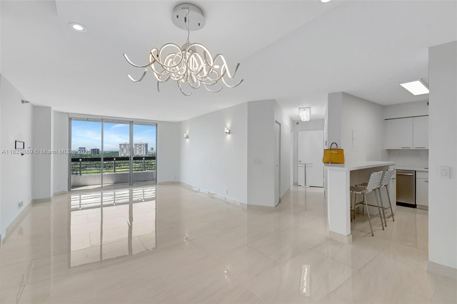 PERFECTION! NEW! NEW! NEW! THIS RENOVATED RESIDENCE IS WHITE, LIGHT, & BRIGHT! NEW KITCHEN & BATHROOMS. ENTER & IMMEDIATLEY & THROUGHOUT SEE PANORAMIC GOLF COURSE LAKE & CITY VIEWS TO TAKE YOUR BREATH AWAY. THIS COVETED 2 BEDROOM/2 BATH SPLIT FLOOR PLAN HAS A LARGE WRAP AROUND BALCONY. FINEST FINISHES INCLUDE ALL NEW SHADES, MODERN STUNNING LIGHTING FIXTURES, NEW WASHER/DRYER, LARGE CLOSETS, TOP OF THE LINE APPLIANCES, ALL NEW BATHROOMS - RAIN SHOWER & JETS. ALL WHITE & GREY - A MODERN GEM.
AMENITIES INCLUDE: BBQ Area, Gym, Kid's Playground, Billiards, Valet, 24/7 Front Desk Concierge Security and Security Gated Access, + more!