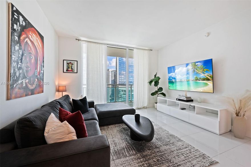 Experience elevated urban living in this beautifully furnished condominium located in the heart of Miami. Situated on the 36th floor, this residence offers stunning city views. The open floor plan features marble floors, a modern kitchen with stainless steel appliances, and spacious living areas ideal for comfortable everyday living. The primary bedroom provides ample space and a generous walk-in closet. Residents enjoy full-service amenities including a state-of-the-art fitness center, swimming pool, business center, and 24-hour concierge. Perfectly located near top dining, shopping, and entertainment, this is an exceptional opportunity to enjoy luxury city living. Minimum lease period of one year required. Unfurnished.