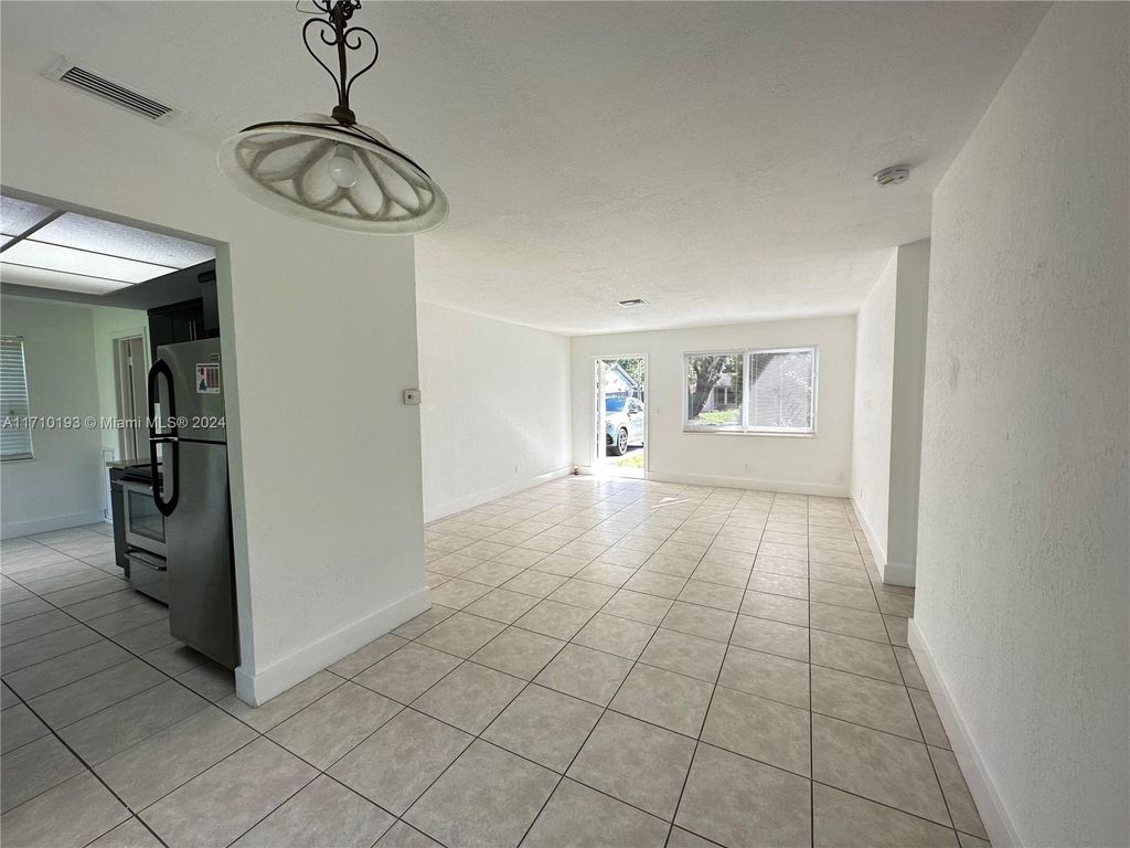 Photo of 2641 NW 47th Ave, Lauderhill, FL 33313 (MLS # A11710193)