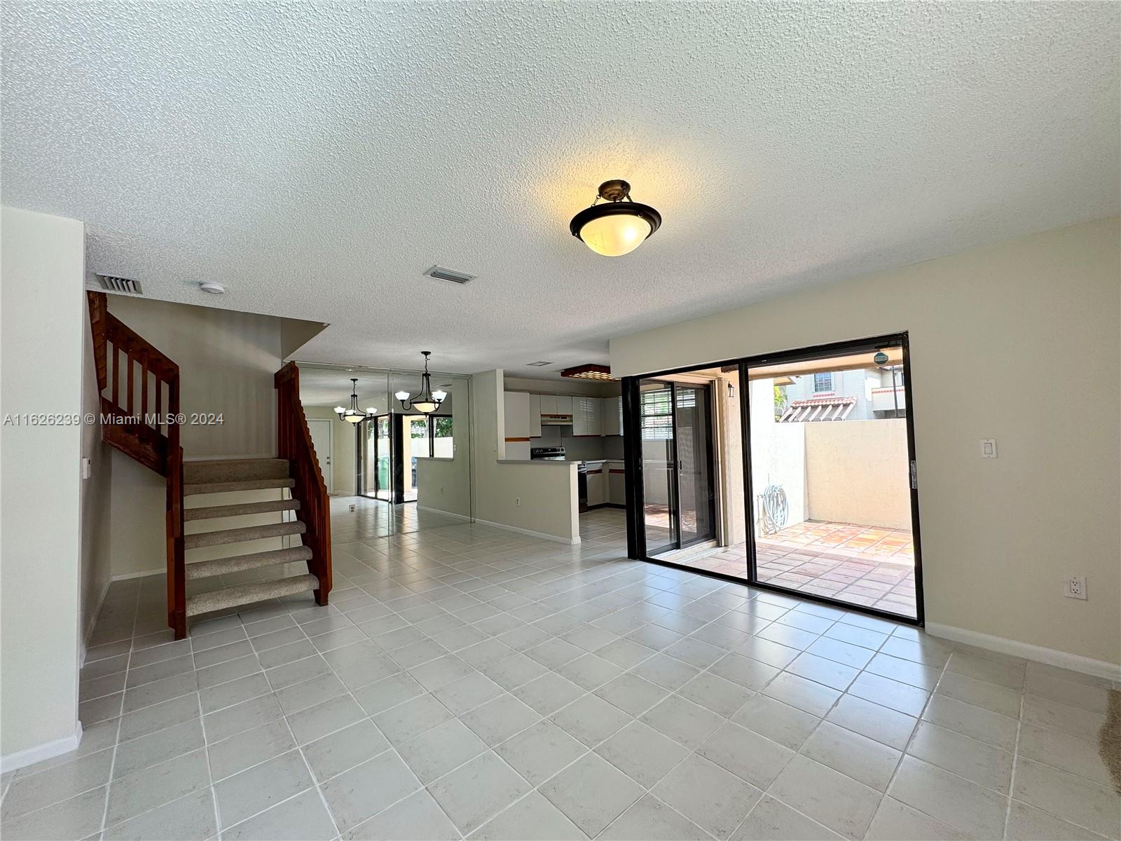Photo 2 of 75 of 13272 SW 114th Ter 0 townhome