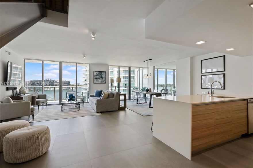 Splendid, direct waterfront, 3 bedroom - 3.5 bath, 7th floor Penthouse with expansive roof top terrace. Located in a small 114 unit boutique building overlooking the pool with views of the Bay, Canal, Intracoastal & Allison Island. 
Amenities include: pool, jacuzzi, sauna, gym, 24 hour concierge, valet & new waterfront BBQ area. Great location, walking distance to beach, parks, shopping, Publix and restaurants.  Unit features two (2) assigned, covered, parking spots. A pleasure to show.