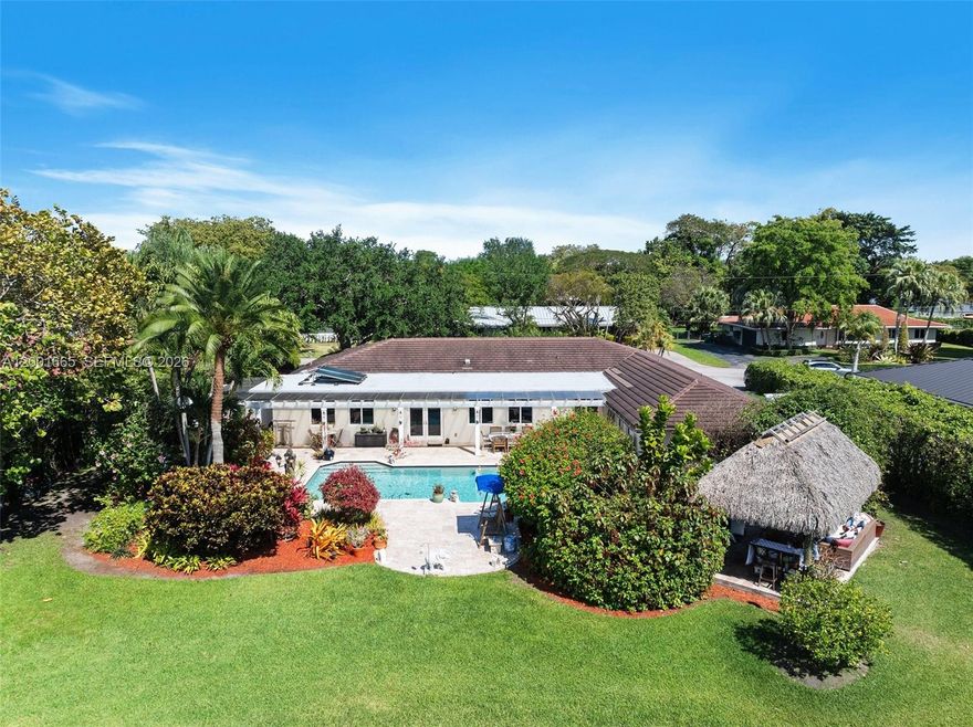 OWNER FINANCE POSSIBLE!! TURNKEY HOME, QUIET neighborhood in PINECREST; FULL HOUSE AUTO GENERATOR; NEW ROOF; Huge Primary Suite, Bay Window, Walk-in closet + Spa-like bath, w/Jacuzzi; Impact windows/doors thru/out, front door/shutters; 5 Bed/3.5 Bath, + lots of storage; w/2 Car Garage; Chef’s kitchen, Custom Cabinetry, Granite Counters/top of line appliances, tall Wine Fridge, Eat-in-kitchen; Formal dining Rm, Living Rm & HUGE Florida room; French doors thru-out; OUTDOOR KITCHEN & BBQ area; Covered Wood Trellis Patio; TIKI HUT w/big screen TV, Fan, etc.; Pool w/Fountain & meticulous gardens! Built-in outdoor multi. storage; Enjoying Miami’s indoor/outdoor lifestyle; Solar Hot Water system; PINECREST Schools/Parks; SPECTACULAR SUNSETS over Water views- 3D MATTERPORT LINK