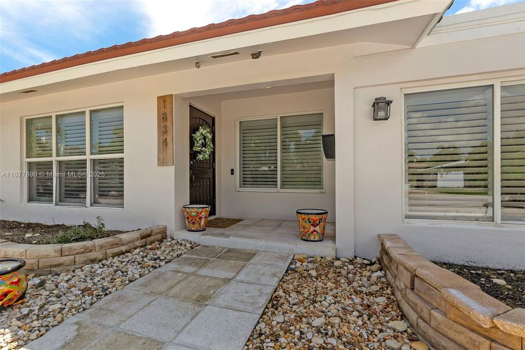 Photo of 1834 NE 34th St, Oakland Park, FL 33306 (MLS # A11877890)