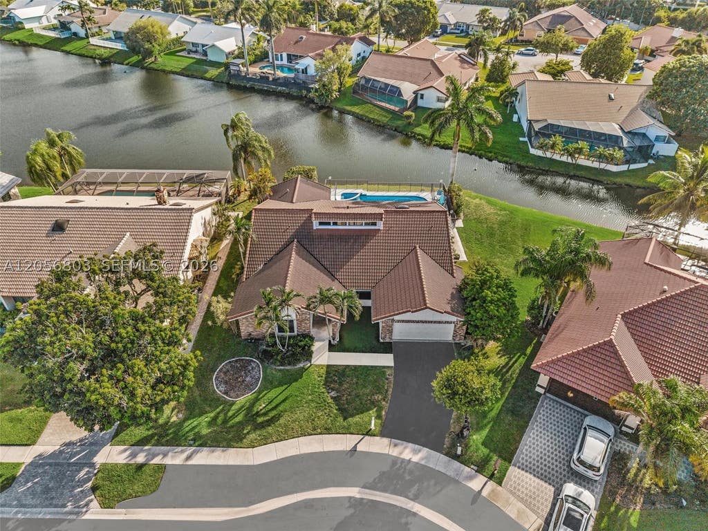 Photo of 1661 NW 100th Way, Plantation, FL 33322 (MLS # A12056803)