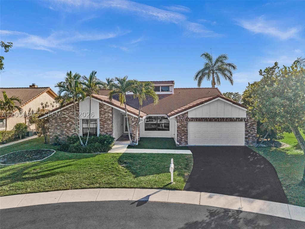 Photo of 1661 NW 100th Way, Plantation, FL 33322 (MLS # A12056803)