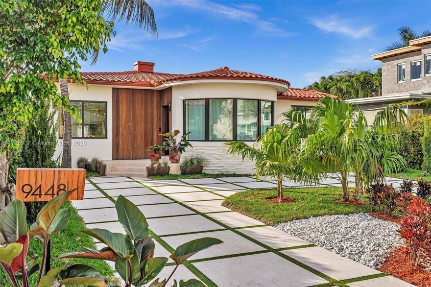 Welcome to this impeccably fully renovated residence, thoughtfully designed by a distinguished French interior designer. Featuring soaring 9.4-foot ceilings, the home exudes a sense of spaciousness and elegance. The Italian-designed kitchen showcases premium quartz countertops, lacquered metal finishes, and seamlessly integrated state-of-the-art appliances, embodying both style and functionality. Every element of the home has been curated with precision, from the  sophisticated lighting fixtures to the organic Japandi paint, ensuring no detail has been overlooked.
Nestled in a prime location, this property is just two blocks from the beach, within walking distance of places of worship, exceptional dining and the exclusive Bal Harbour Shops.
A blend of luxury, design, and convenience.