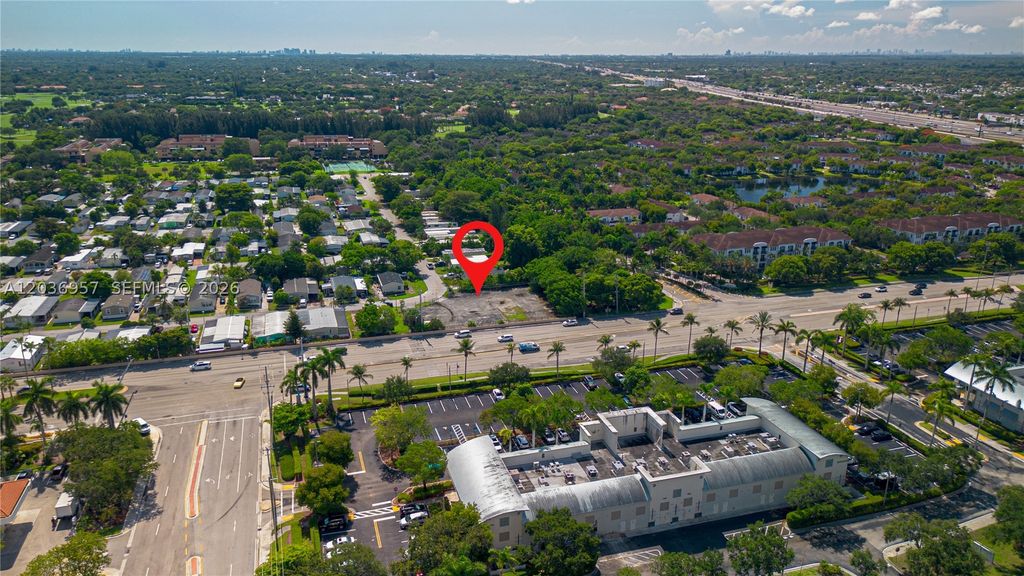 Photo of 311 NW 135th Way, Plantation, FL 33325 (MLS # A12036957)