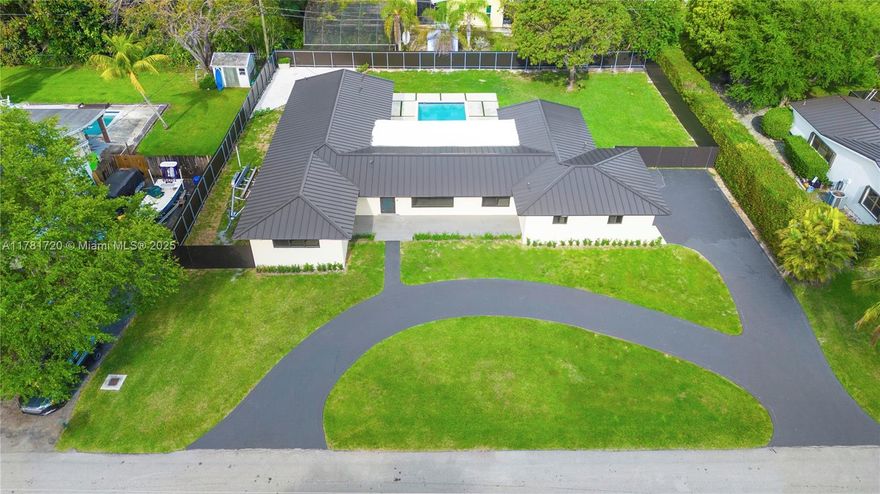 Fall in love with this stunning 4-bed, 3-bath home nestled in the charming and sought-after Palmetto Bay neighborhood. Completely reimagined, this light-filled beauty offers an effortless flow and modern elegance. Enjoy sleek porcelain floors, a gourmet chef’s kitchen with quartz counters, custom cabinets, a wine fridge, and brand-new appliances. The spacious primary suite features a luxurious bath with dual sinks, walk-in closet, and spa-like finishes. Upgrades include a brand-new aluminum roof, impact windows and doors, a 5-ton AC, new washer/dryer, and a beautifully renovated pool with a deck perfect for entertaining—all on a large, fenced-in lot. This is the one you’ve been waiting for!