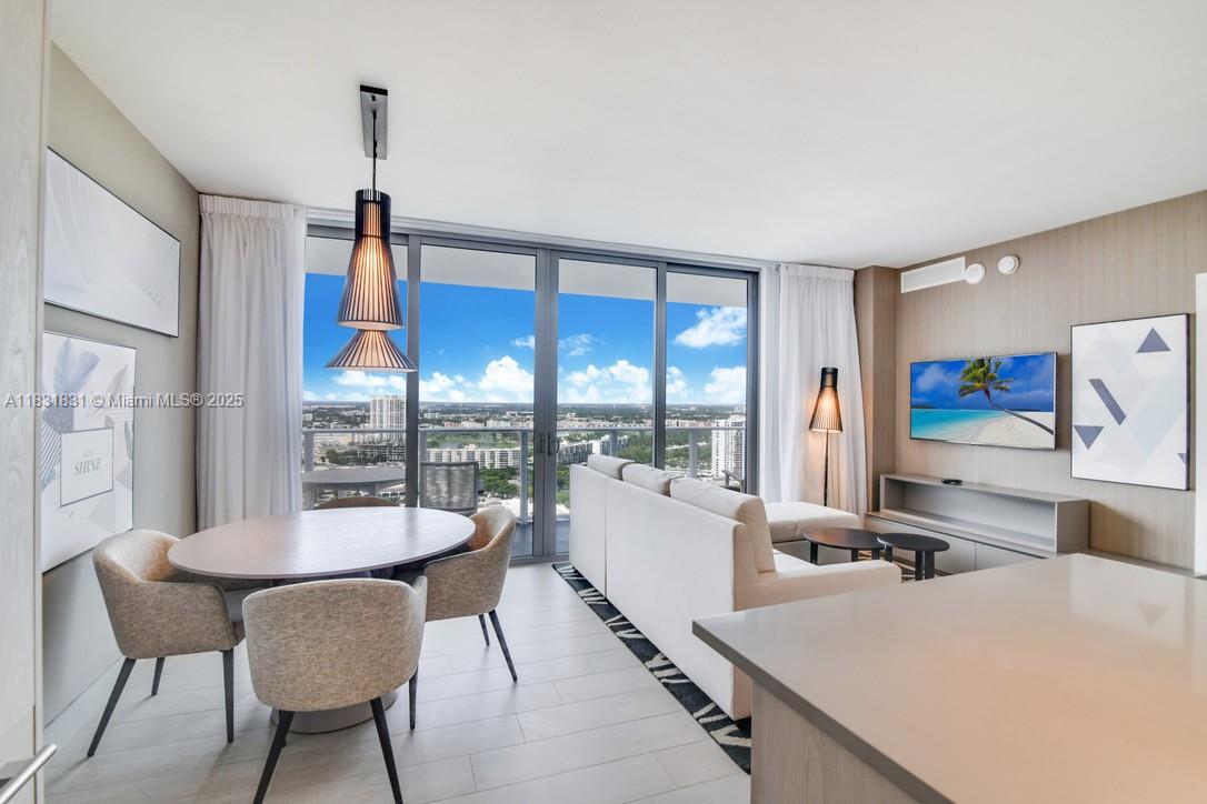 Hyde Beach House is one of the most luxurious condominiums in Hollywood Beach, ideally located on the vibrant Intracoastal Waterway and just steps from the pristine beaches of the Atlantic Ocean. This fully furnished 1 bed, 1.5 baths unit offers stunning panoramic Intracoastal views, a spacious balcony washer & dryer, WiFi, cable TV, a king-size bed in the primary bedroom, and a convertible sofa in the living room. Located on the canal side and facing the beach. Enjoy resort-style amenities including a sports club with tennis and indoor racquetball/basketball courts, two large heated pools, and exclusive access to ETARU Beach Club across the street chairs, towels, umbrellas, and beachfront butler service are part of the building’s services.