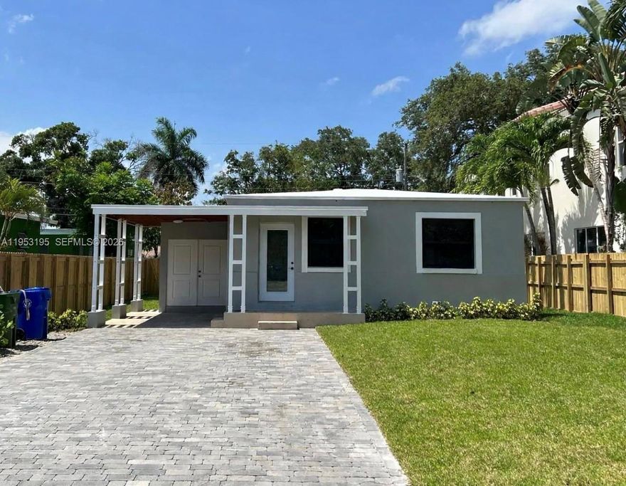 Unique income-producing opportunity on a single lot featuring two separate residences: a 2-bedroom/1-bath single-family home plus a detached 1-bedroom/1-bath home in the desirable Tarpon River neighborhood of Fort Lauderdale. The rear unit is independently metered and recognized, offering excellent flexibility for rental income or multi-generational living. The main residence features impact windows and doors and a 2025 roof, along with A/C (2021), water heater (2017), washer/dryer, and appliances replaced in 2023. The updated kitchen includes white shaker cabinetry, quartz countertops, stainless steel appliances, recessed lighting, and neutral tile flooring. The detached 1/1 with private rear access features impact windows and a 2025 flat roof, tankless water heater, two window A/C units, and updated kitchen, bath, and flooring. Washer/dryer hookup available. Live in one unit while generating income from the other, or rent both while holding for future development potential. No HOA.