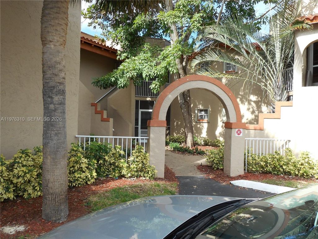 Photo of 301 SW 86th Ave #102, Pembroke Pines, FL 33025 (MLS # A11976310)