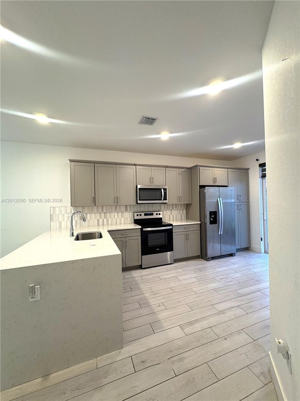 Photo of 135 SW 171st Ln #135, Pembroke Pines, FL 33027 (MLS # A12012050)