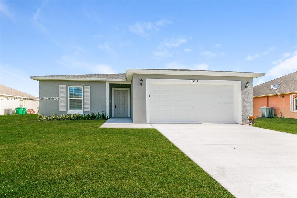 Photo of 373 SW Fig Ave, Port St Lucie, FL 34953 (MLS # A11878831)