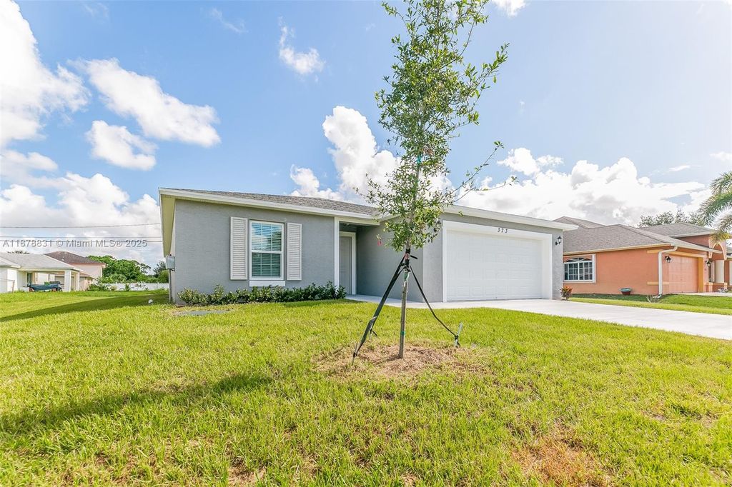 Photo of 373 SW Fig Ave, Port St Lucie, FL 34953 (MLS # A11878831)