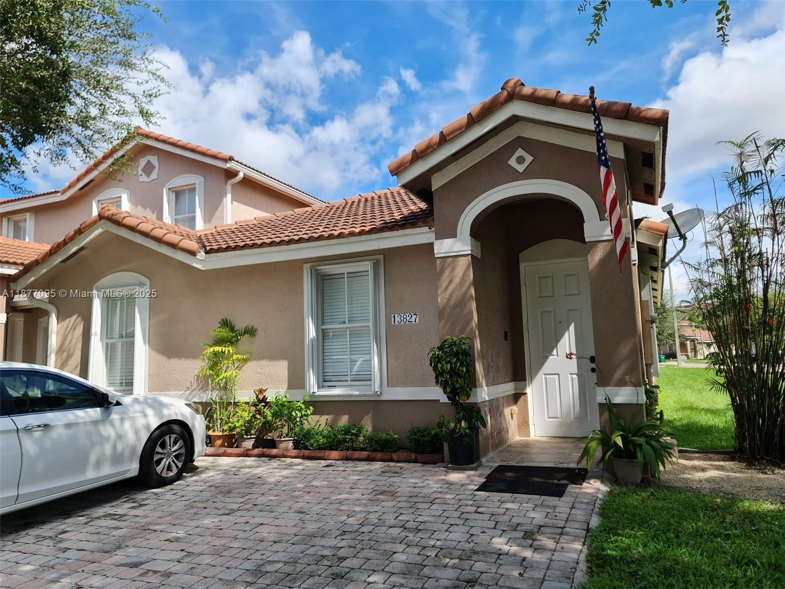 Beautiful and spacious one story corner townhouse located in a gated community with 24/7 security. This home features a confortable master bedroom with walk-in closet, hurricane shutters, and a bright layout thanks to its corner location. The community offers a pool, clubhouse, and well maintained common areas. Conveniently located right off Florida's Turnpike, Exit 6, close to schools, shopping centers, restaurants. Ideal for families, first-time home buyers, or investors seeking a great opportunity.