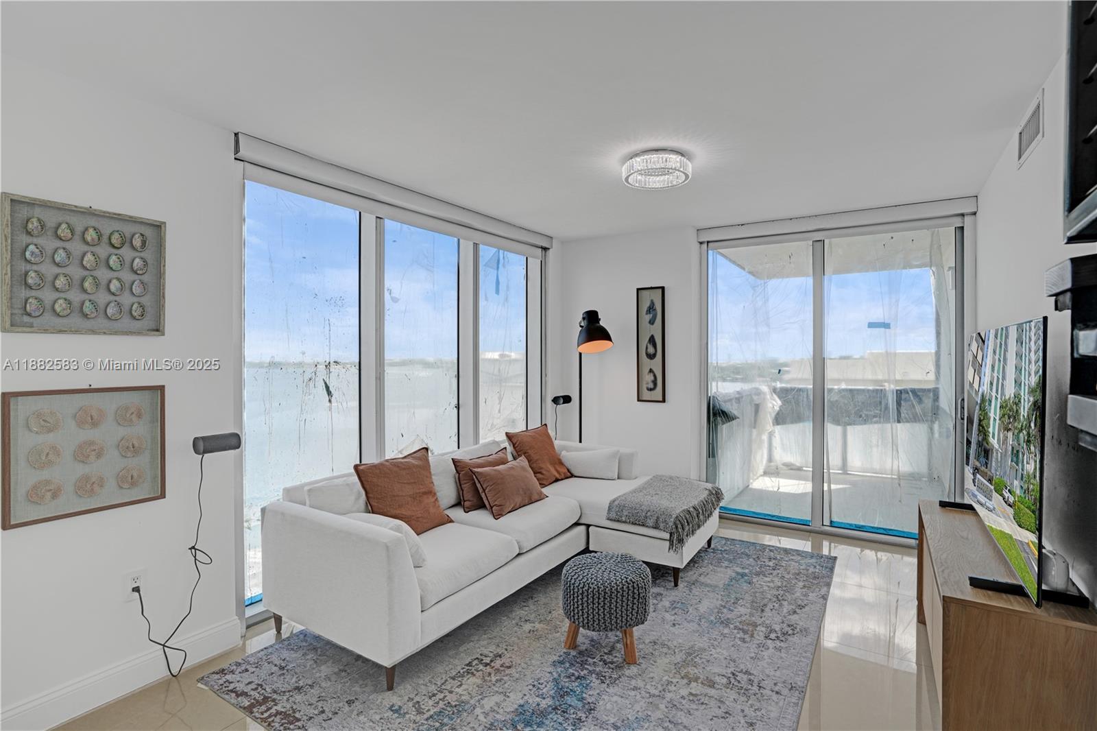 ELOQUENCE ON THE BAY COND - Residential Lease