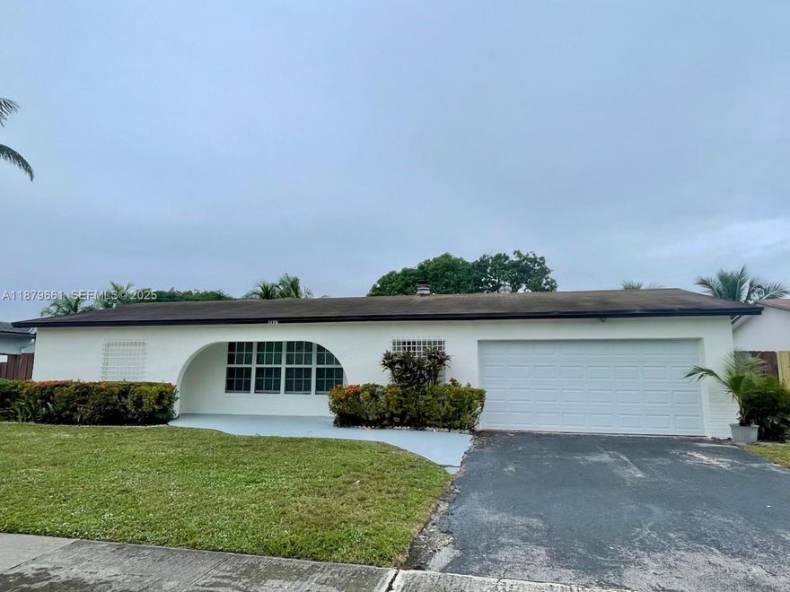 Welcome to Pembroke Pines! See and secure this spacious single-family property nestled in the highly sought after (no HOA) neighborhood of Westview. Enter this gracious 4 bedroom, 2 bathroom home and instantly feel 2,195 sq feet of living space. Walk outside and feel the pleasure of having a home on an 8,625 sq ft waterfront lot. This home is perfect for a family seeking PRIVACY, comfort, freedom, functionality and mature neighborhood charm! The split-bedroom floor plan, gives maximum privacy. The owners suite sits on one side with the extra room while three additional bedrooms occupy the other. The extra room is perfect for an office, gym or media room. Multiple living areas offer options for family room, formal dining room, or a sun-filled Florida room.