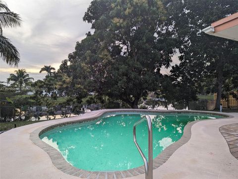 Photo of 1190 NW 92nd Ave, Pembroke Pines, FL 33024 (MLS # A11879661)