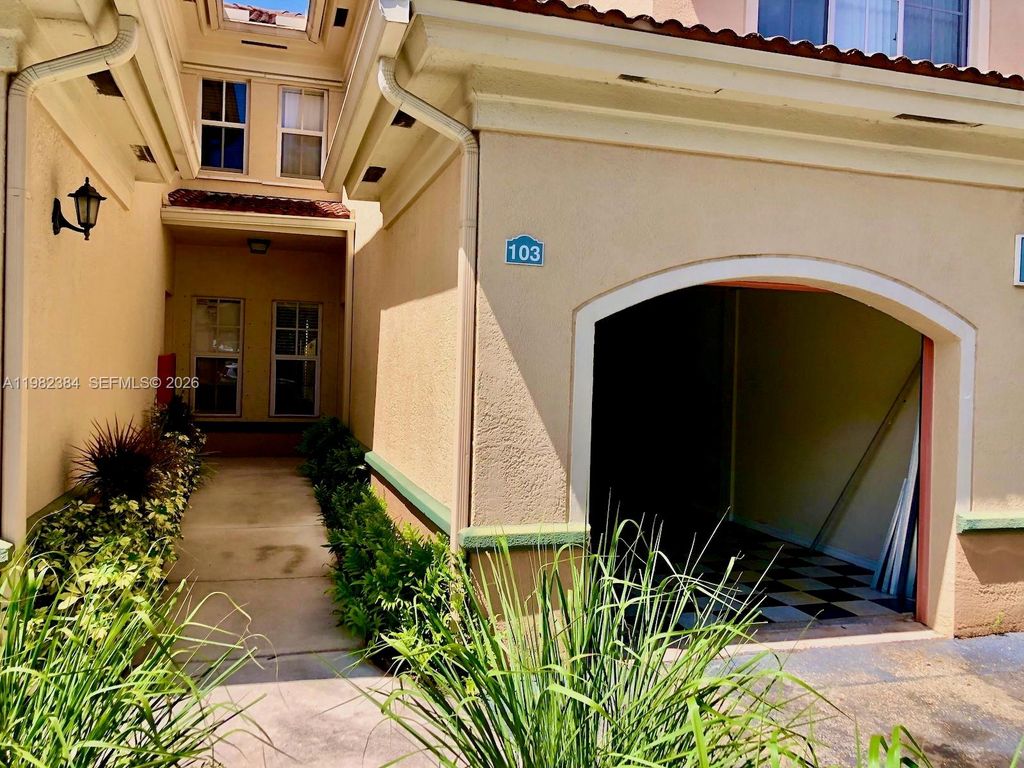 Photo of 2557 Centergate Dr #103, Miramar, FL 33025 (MLS # A11982384)