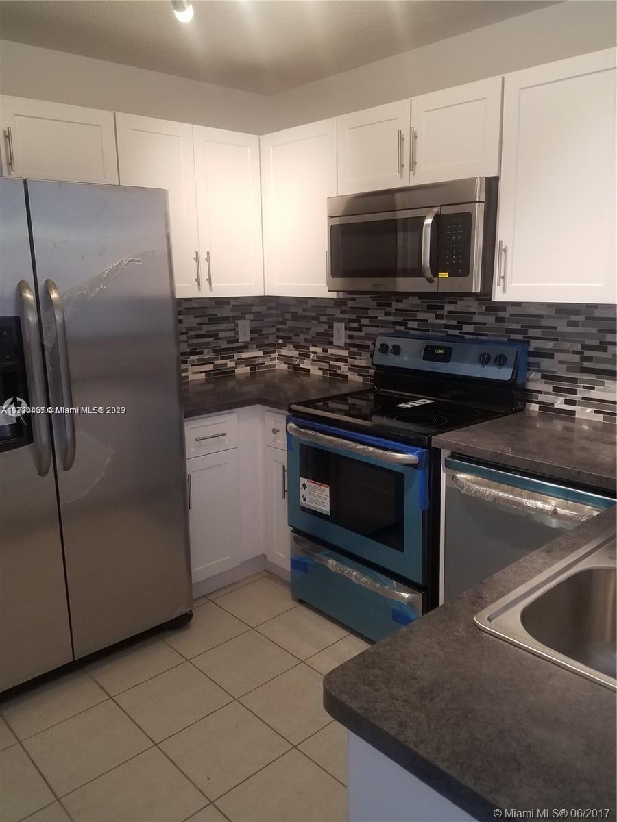 THE GATES AT DORAL ISLES - Residential Lease