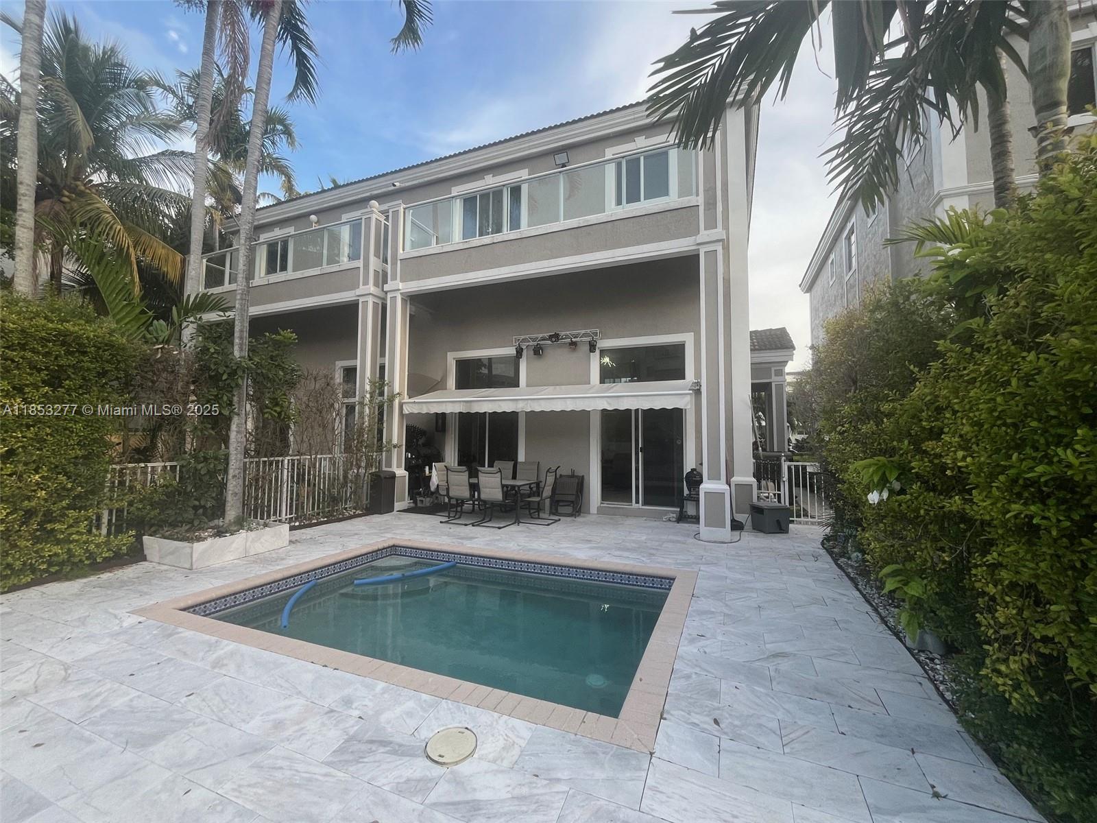 Spacious townhouse with private pool and private dock for boats up to 30 feet. Renovated, 3 bedrooms, 3 bathrooms, plus a den or man cave, private elevator. Option to rent furnished or unfurnished.
