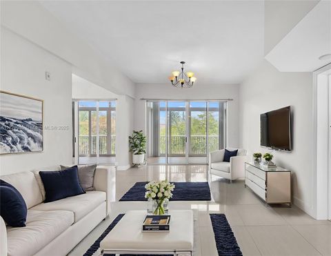 Photo of 619 E Sheridan St #406, Dania Beach, FL 33004 (MLS # A11779965)