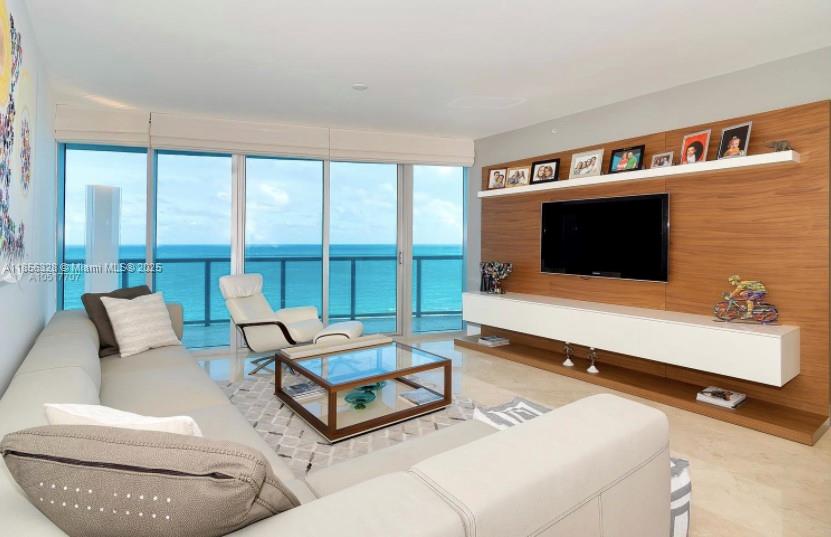 Available on Aug 11th - Lease for 6 months - Excelente unit at the luxurious living Jade Beach that just completed a huge remodeling on the entire building (The east poll isn't open yet). Elegant and functional 3 beds ,3 ½ baths, marble floors throughout, flow-through layout, private elevator, 5 star amenities including: 2 pools, oceanfront gym and spa, children's play room, card room, theater, bike storage, beach-pool service, cafeteria, storage, 1 assigned parking spots, valet and more… MUST SEE - EASY TO SHOW BREATHTAKING AND UNOBSTRUCTED OCEAN, CITY & INTRACOASTAL VIEWS