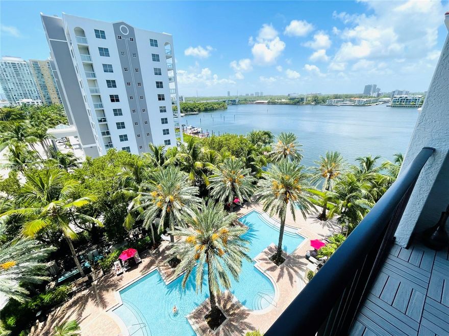 Beautifully upgraded 2-bedroom, 2-bath lower penthouse in the heart of Sunny Isles Beach, featuring southern exposure, tile flooring, in-unit laundry, and an open-concept kitchen. The spacious primary suite offers a large bathroom with double sinks, a linen closet, and a walk-in closet, while the balcony provides partial bay and city views with space to dine or unwind. Enjoy resort-style amenities at Porto Bellagio, including two pools, a jacuzzi, a new gym, clubhouse, private promenade, and more. Covered, assigned parking included. Walking distance to the beach, shops, restaurants, and a top-rated K–8 school. Pet-friendly community.