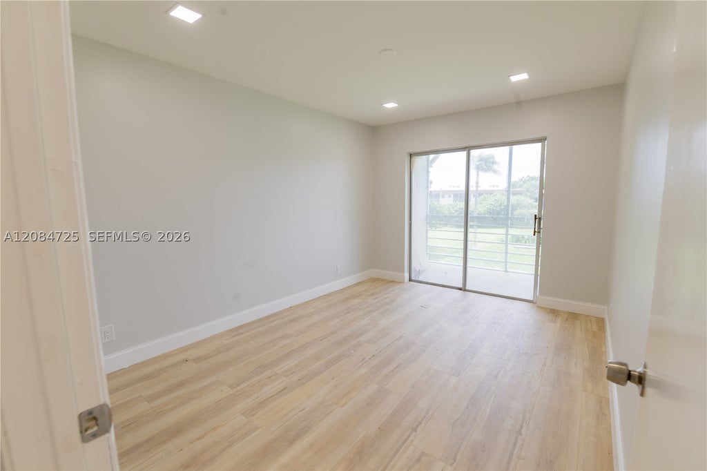 Photo of 2100 Springdale Blvd #314, Palm Springs, FL 33461 (MLS # A12084725)