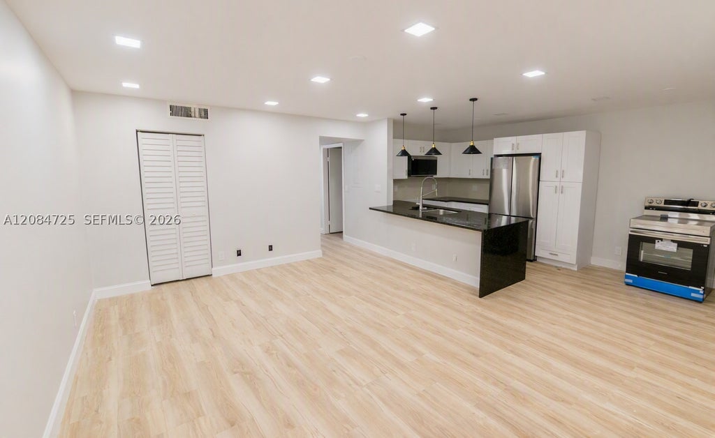 Photo of 2100 Springdale Blvd #314, Palm Springs, FL 33461 (MLS # A12084725)