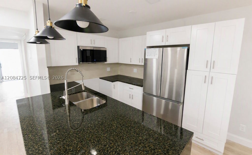 Photo of 2100 Springdale Blvd #314, Palm Springs, FL 33461 (MLS # A12084725)
