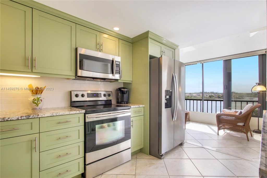 Photo of 1648 Jupiter Cove Dr #512B, Jupiter, FL 33469 (MLS # A11459276)