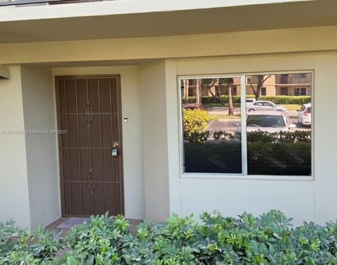 Photo of 1001 SW 141 St Ave #107K, Pembroke Pines, FL 33027 (MLS # A11919425)
