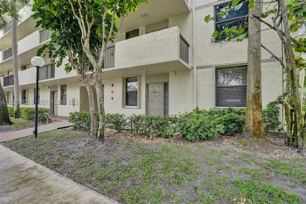 Photo of 2908 S Carambola Cir S #106, Coconut Creek, FL 33066 (MLS # A12037218)