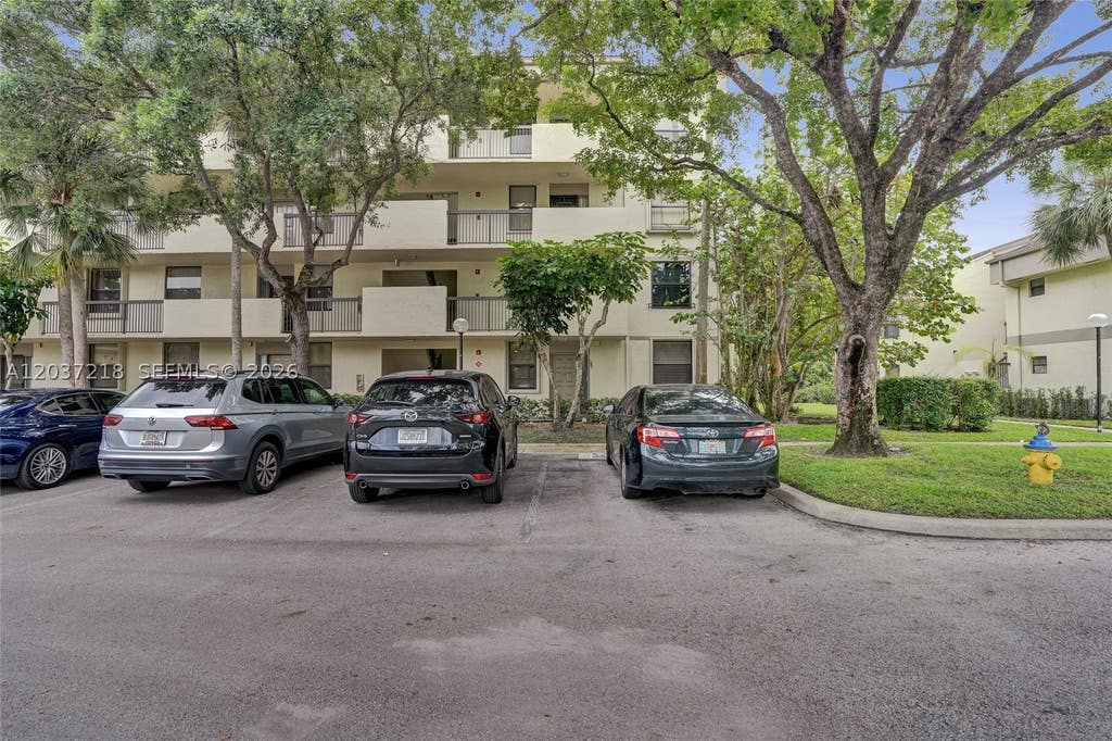 Photo of 2908 S Carambola Cir S #106, Coconut Creek, FL 33066 (MLS # A12037218)