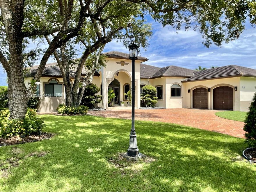 Discover elegance and space in this stunning 5 bed/ 4.5 bath + office, nestled in a coveted neighborhood with no HOA restrictions. Perfectly blending modern comfort with timeless design, this residence offers a lifestyle of unparalleled luxury. A gourmet kitchen equipped with, induction stove, double islands & SS Appliances. Unwind in the expansive Owners' suite featuring double walk-in closets & spa-like ensuite with double vanities. Host gatherings effortlessly in the generously-sized living areas and outdoor covered terraces. A dedicated home office ideal for remote work or study, designed for productivity. Enjoy the serene landscaped gardens & custom-designed heated salt water pool with spa. Side gate with ample storage for 32 ft boat or RV!. See broker remarks for showing and features