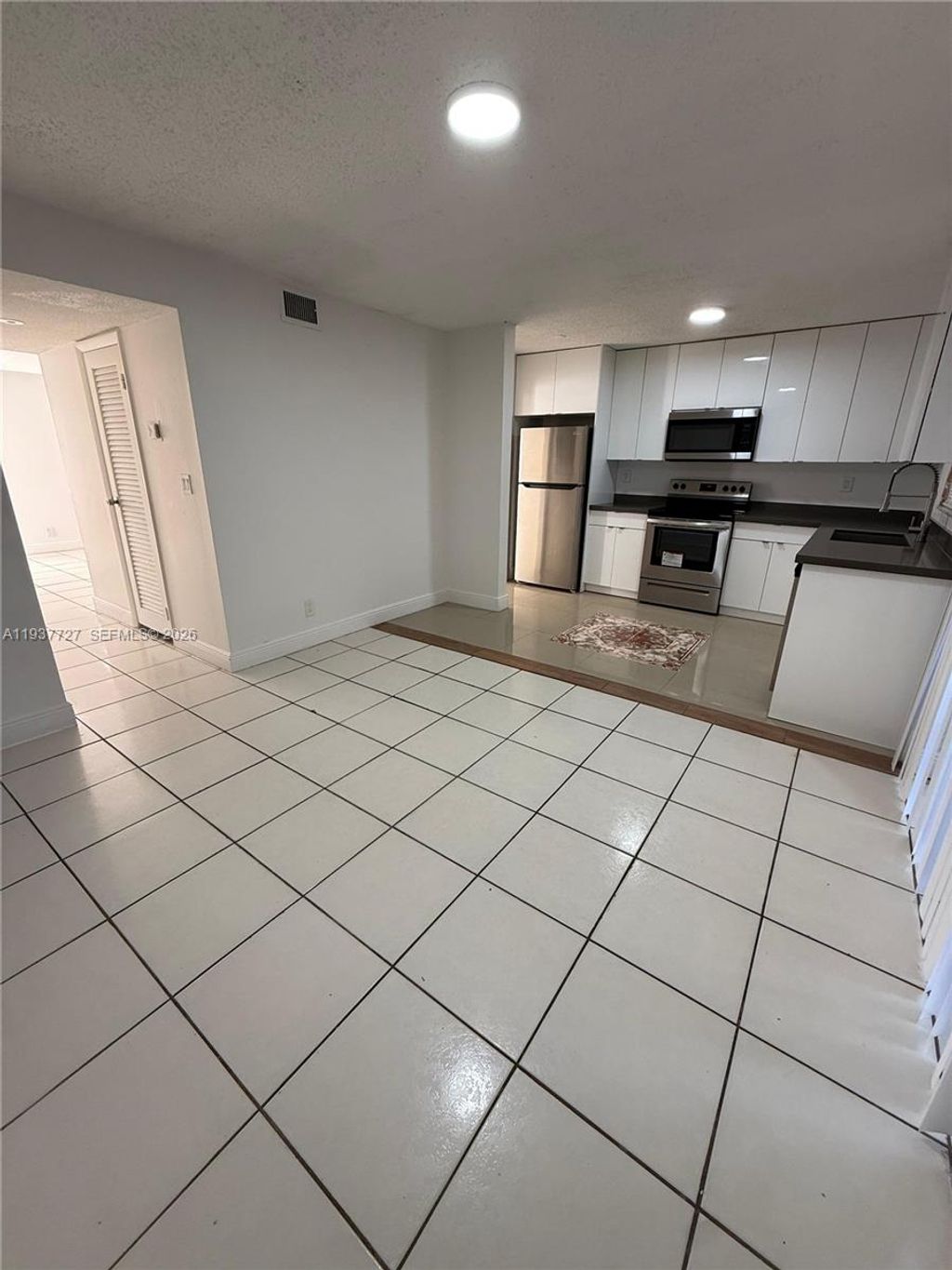 Photo of 5817 Blueberry Ct #92, Lauderhill, FL 33313 (MLS # A11937727)