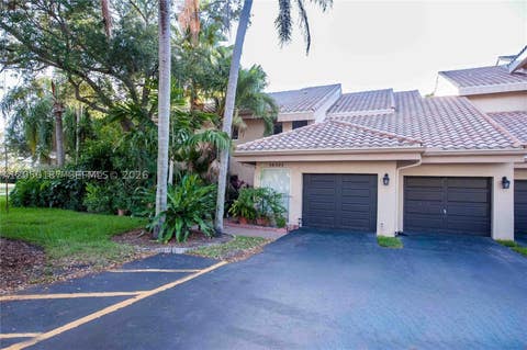 Photo of 16301 Malibu Dr #79, Weston, FL 33326 (MLS # A12050187)