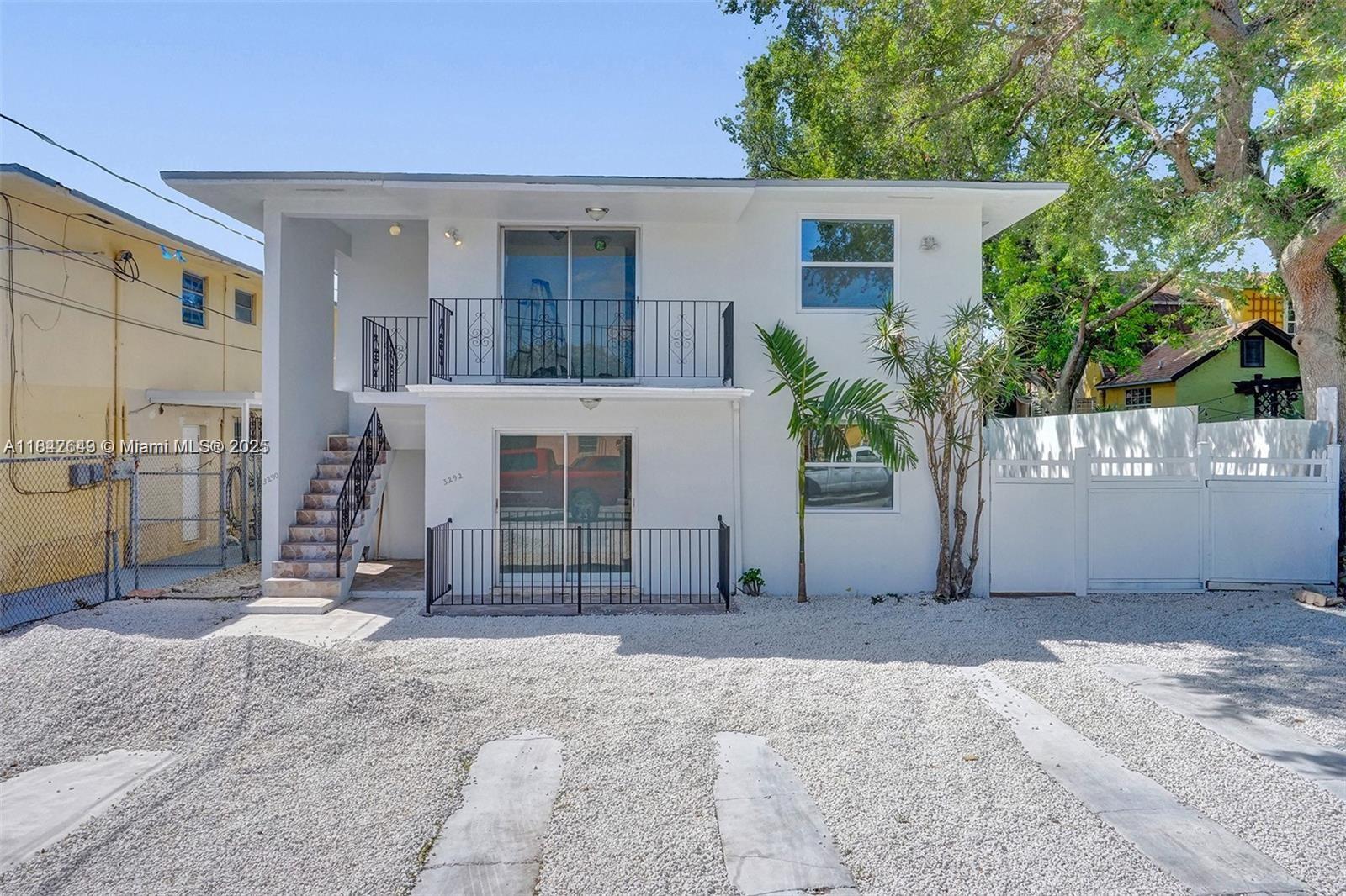 Centrally located duplex upstairs unit with balcony. 3/2 with a new kitchen and new stainless steel appliances. Freshly painted. New closet designed. Laundry inside the unit. Close to everything: Downtown, Coral Gables, Coconut Grove, and the beach. 2 parking spaces plus street parking. You must see it!