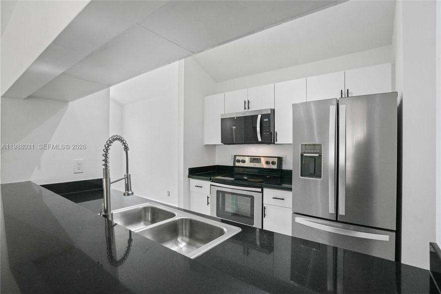 Welcome to this beautifully renovated 2-bedroom, 2-bathroom second-floor corner unit in in a gated community in the heart of the Hammocks. Offering 1,075 sq ft of thoughtfully designed living space, this move-in ready condo perfect for both homeowners and investors. 

This unit has been freshly painted throughout, including ceilings, doors, baseboards, main door, and balcony, giving it a crisp, modern feel. The kitchen and bathroom cabinets have been renovated, complemented by new ceiling fans and updated finishes, making this unit truly turnkey.

Located in a quiet 2-story building. Enjoy your private outdoor balcony? As a corner unit, you?ll appreciate the added privacy and tranquil setting, with nature views and no rear neighbors or obstructed sightlines.

Includes one assigned parking space plus guest parking with decal. 

Residents enjoy access to a variety of community amenities, including a swimming pool, tennis courts, and basketball courts, gym, and kids's playground. HOA covers water and garbage removal

Conveniently situated near Publix, banks, restaurants, gas stations, an ice arena, and everyday essentials.