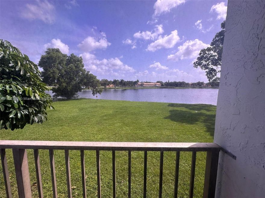 Beautiful 2 bedrooms and 2 bathrooms with direct lake view !!! All tile floors, updated kitchen and bathrooms,
 freshly painted, washer and dryer inside the unit. Excellent gated community of Lakeshore with 24hrs security.
