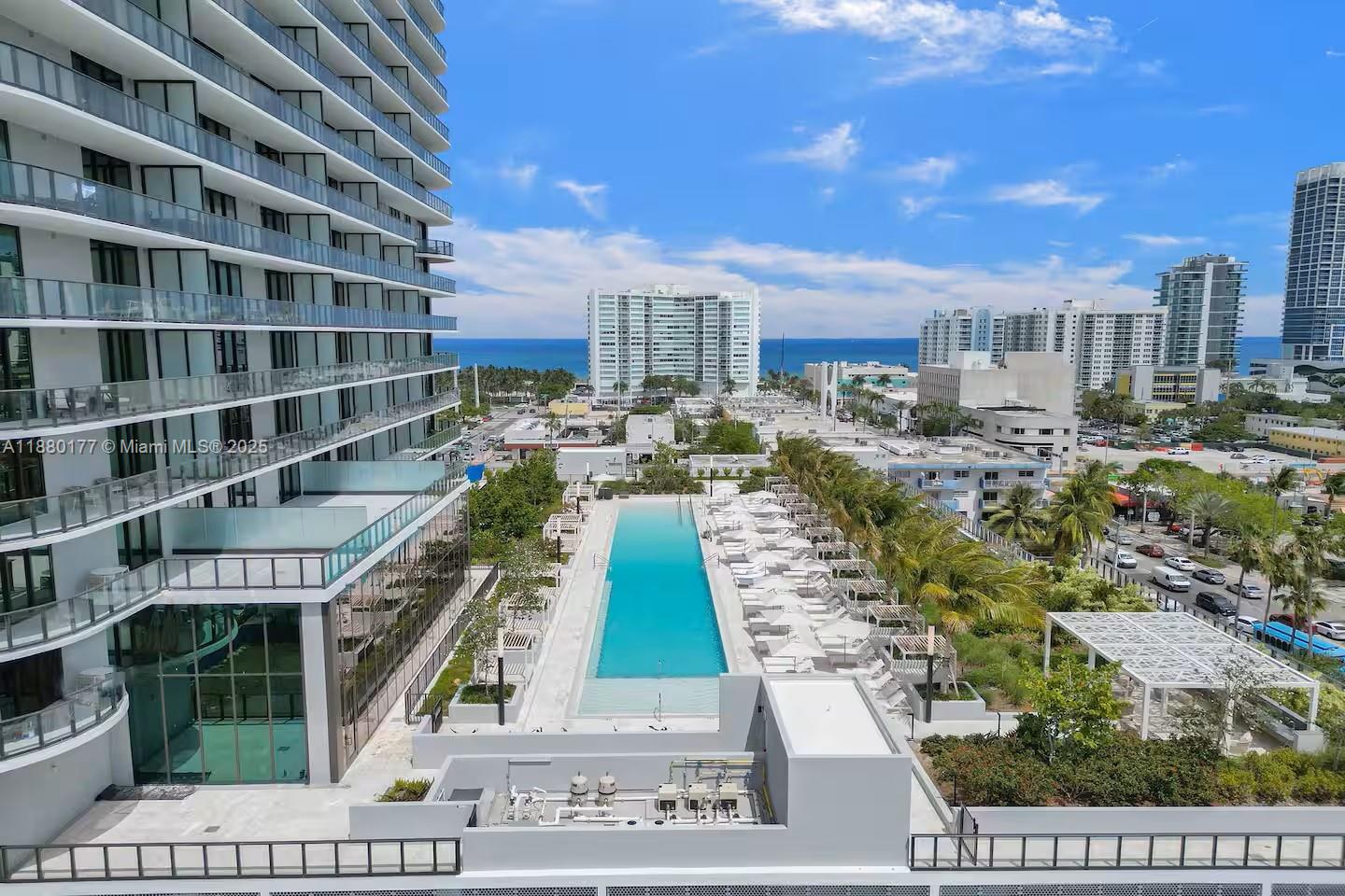 Experience luxury living at this exceptional 22-story building in Miami Beach. Junior 1 Bedroom, 1 Bath with a modern layout and expansive private balcony. Perfectly situated blocks from the beach and approved for short-term rentals, the property features a grand double-height lobby, advanced smart-building technology, and resort-style amenities. Enjoy a 150-foot pool with cabanas, a fitness center, yoga lounge, kids’ playroom, and multiple dining venues. Residents benefit from a private rooftop with panoramic views, a golf cart shuttle to the beach, and lifestyle concierge services. Each residence comes fully furnished with floor-to-ceiling glass doors, high ceilings, and breathtaking views of the ocean, park, and skyline.