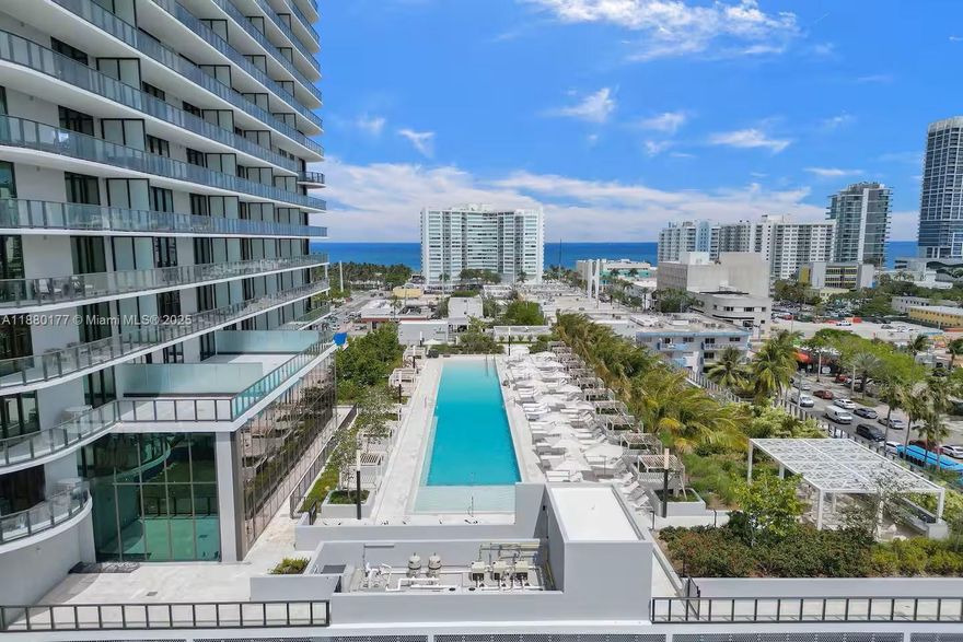 Experience luxury living at this exceptional 22-story building in Miami Beach.  Junior 1 Bedroom, 1 Bath with a modern layout and expansive private balcony. Perfectly situated blocks from the beach and approved for short-term rentals, the property features a grand double-height lobby, advanced smart-building technology, and resort-style amenities. Enjoy a 150-foot pool with cabanas, a fitness center, yoga lounge, kids’ playroom, and multiple dining venues. Residents benefit from a private rooftop with panoramic views, a golf cart shuttle to the beach, and lifestyle concierge services. Each residence comes fully furnished with floor-to-ceiling glass doors, high ceilings, and breathtaking views of the ocean, park, and skyline.