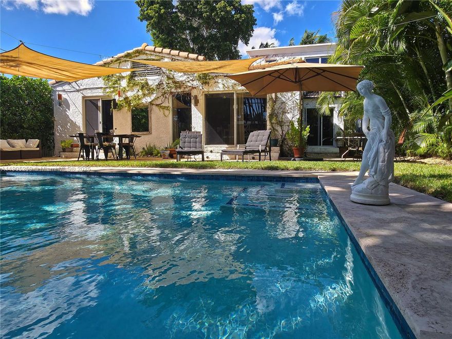 This stunning 4-bedroom, 3-bathroom gem is located in the trendy Isle of Normandy Miami Beach —Step into a sunlit, open-concept oasis blending elegance and tropical charm. With a private pool surrounded by swaying palm trees, this home embodies the essence of resort-style living. Perfectly situated between Miami's vibrant city center and pristine beaches, it offers seamless access to both. Discover unparalleled value and sophistication in Miami! It's one of the  hottest address, where visionary luxury meets iconic design. As the chosen setting for world-renowned architects, exclusive condominiums, and the upcoming Ritz Carlton, this neighborhood is transforming into Miami's crown jewel. Don’t miss your chance to call this glamorous and sought-after slice of paradise home—it’s a must-see!