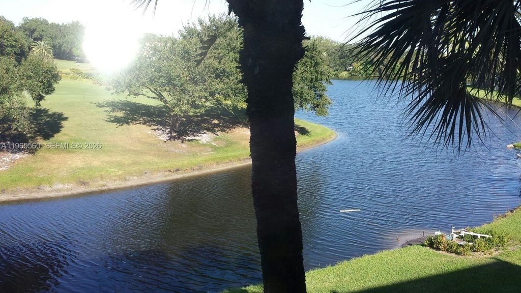 Photo of 9470 Poinciana Pl #301, Davie, FL 33324 (MLS # A11965560)