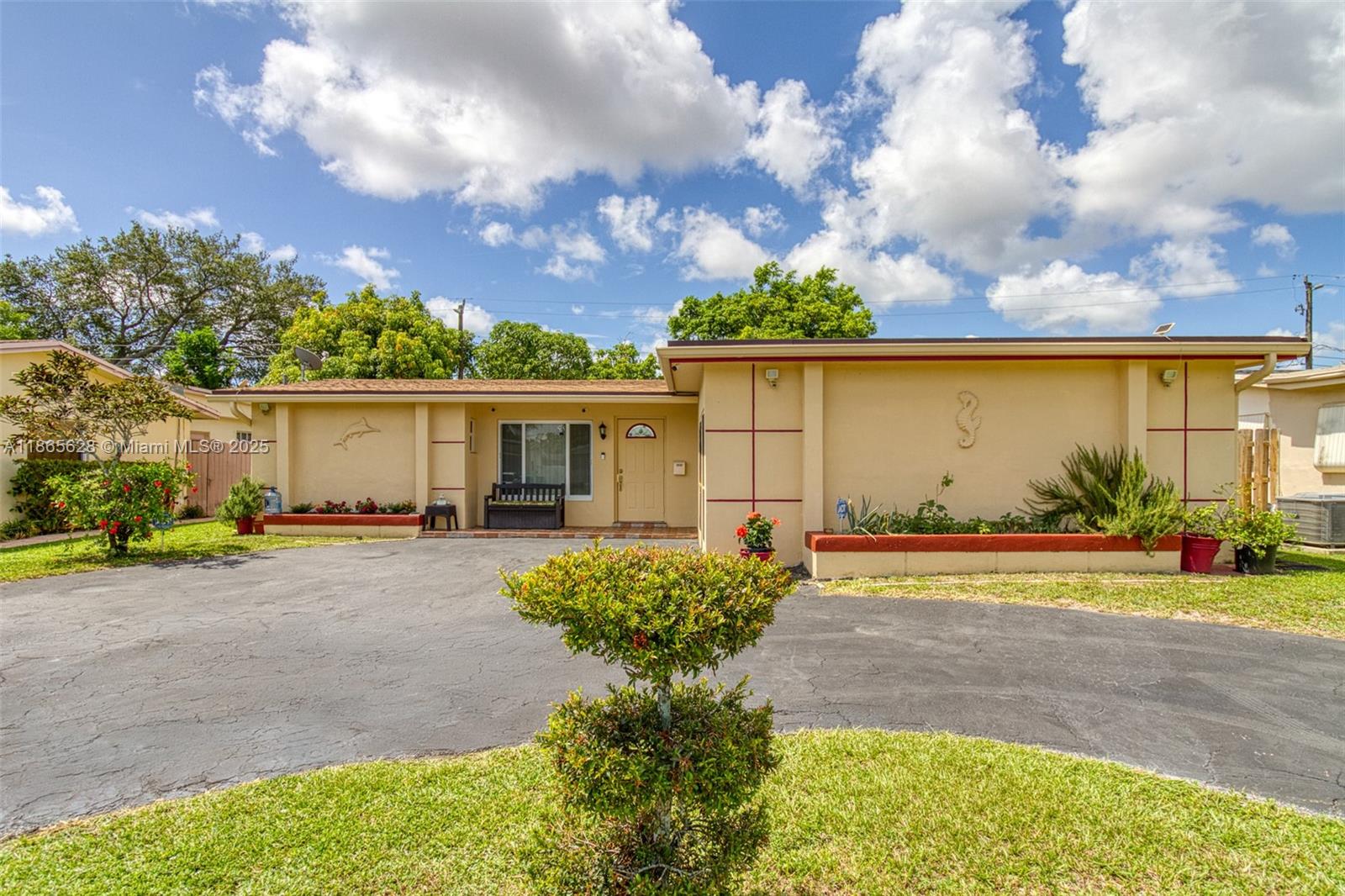 Charming 3BR/2BA home in the heart of Sunrise. Fantastic neighborhood w/ NO HOA, and a fully fenced backyard w/ fruit trees and covered patio. Standout upgrades include a 2023 roof, partial Cat-5 IMPACT windows and garage door, and a 2024 sprinkler system w/ new pump. Circular driveway provides plenty of parking. The oversized 1 car garage includes laundry & storage area, new ceiling with full insulation & keypad entry (2023). Centrally located minutes from Sawgrass Mills, Amerant Arena, Hard Rock Stadium, Hard Rock Hotel, Las Olas & beaches. Quick access to major highways, shopping, dining & entertainment. Close to City Park & Village Beach Club-ideal for an active lifestyle w/ endless recreation & family fun.
