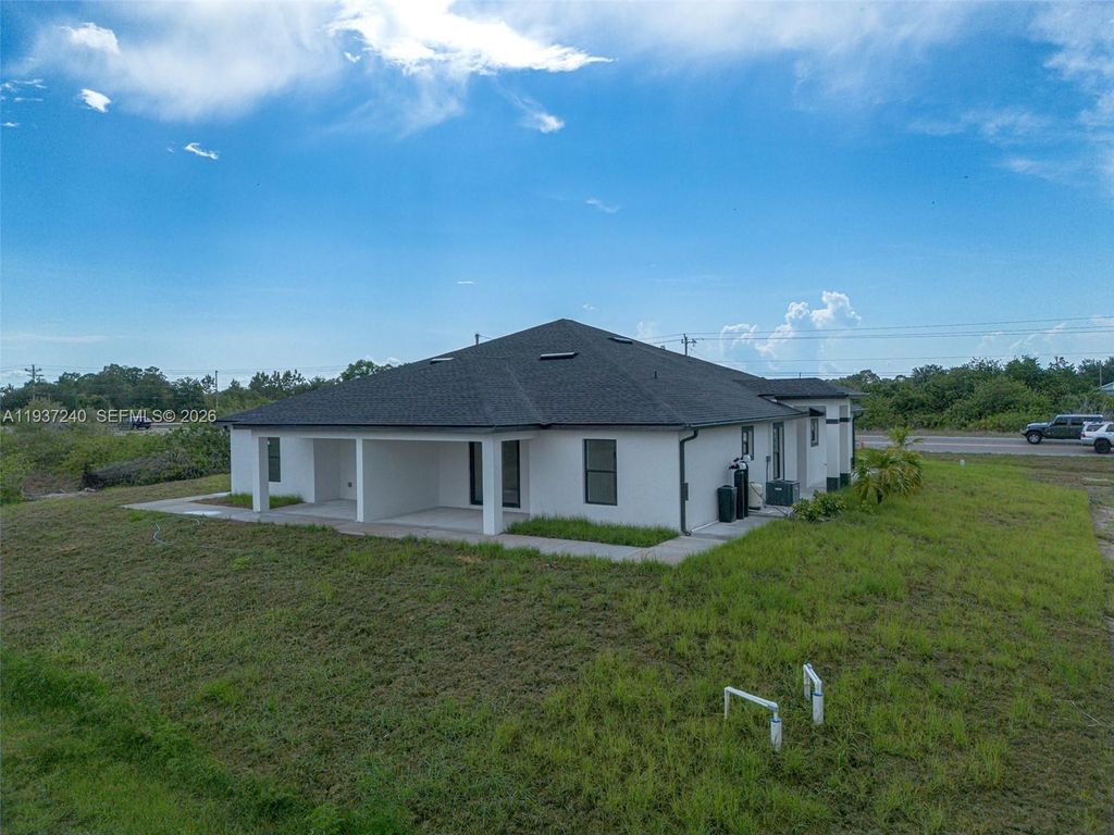 Photo of 842 844 Alabama Rd S, Lehigh Acres, FL 33974 (MLS # A11937240)