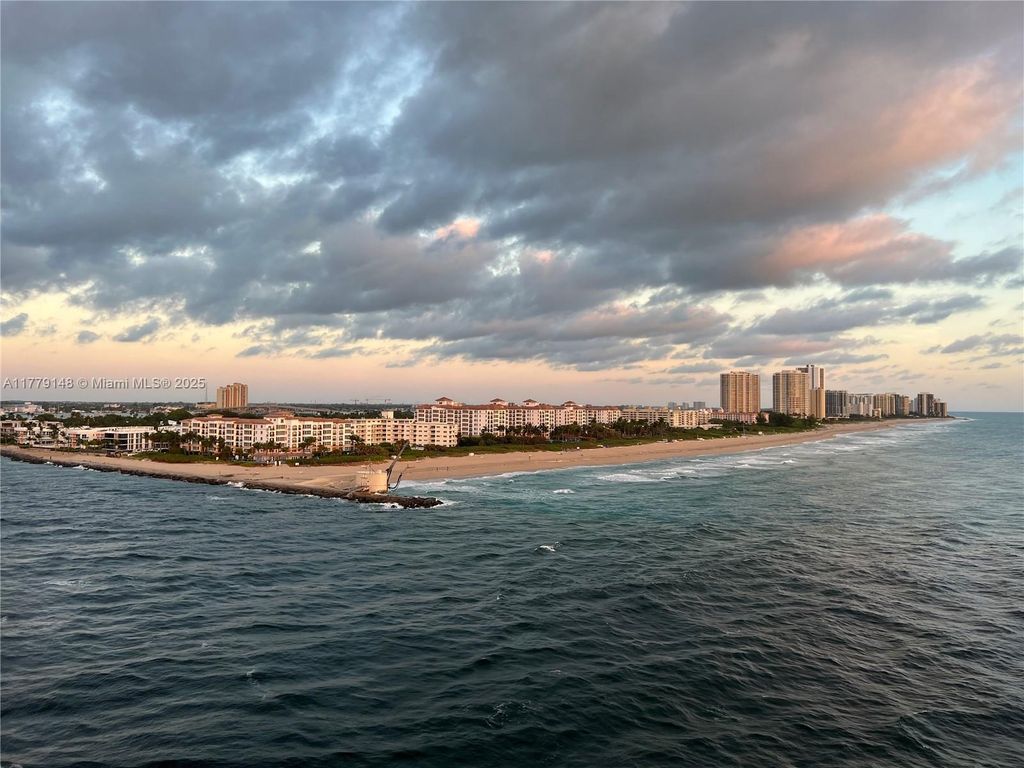 Photo of 125 Ocean Ave #214, Palm Beach Shores, FL 33404 (MLS # A11779148)