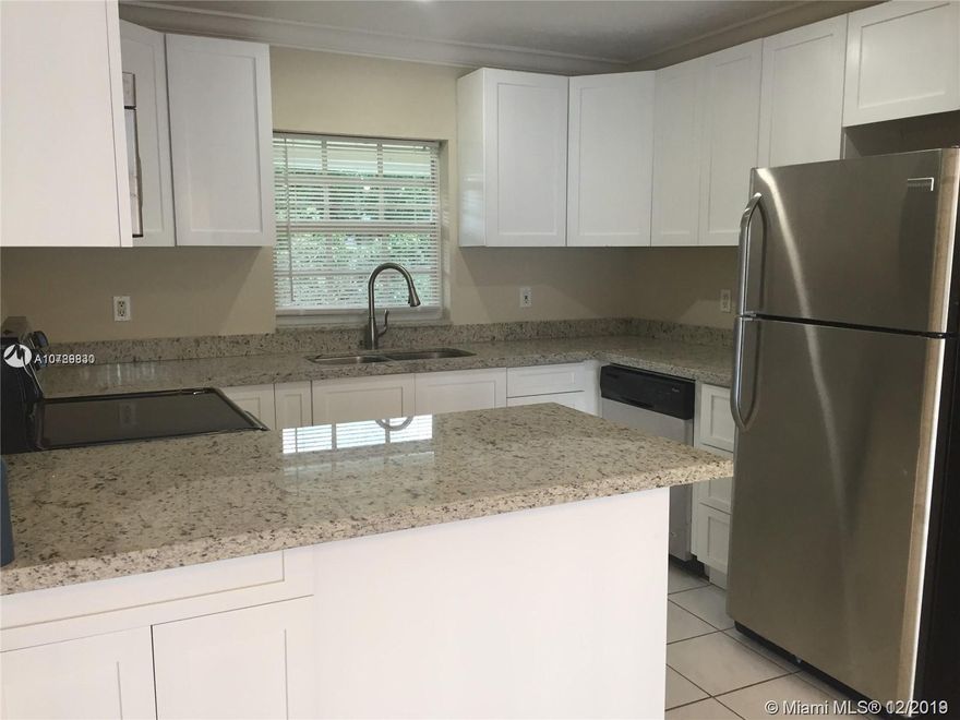 3 bedroom 2 bath home with one car garage located in great quiet neighborhood. This home features all tile floors, white wood shaker kitchen cabinets with granite counter tops and stainless steel appliances. Split bedroom plan. Brand new AC unit. Large fenced backyard with pool, great for entertaining!  Room for a boat! Freshly painted. Vertical blinds and curtains in the dining room. Hurricane shutters. Clean and ready to go! Looking for the perfect family!