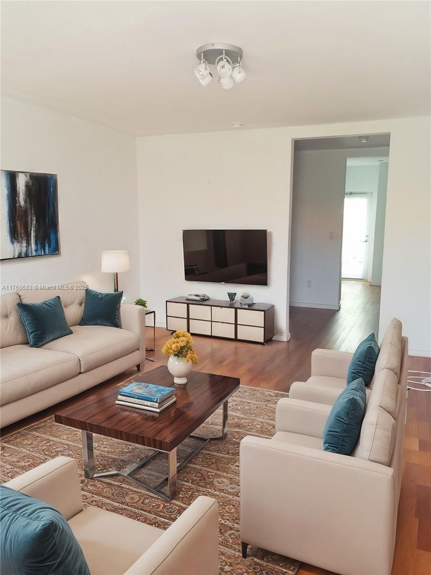 This charming junior one-bedroom is an ideal opportunity for investors or first-time homebuyers. Located just minutes from the beach and nestled close to Flamingo park, featuring wood floors and natural light